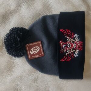 'Thunderbird' Indigenous design by Philip Joe, Salish Pom Pom Toque